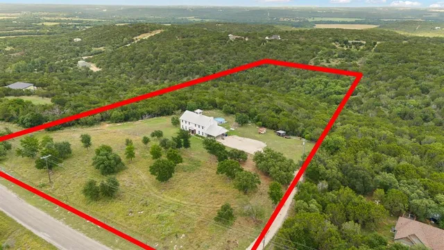 a view of swimming pool from a balcony