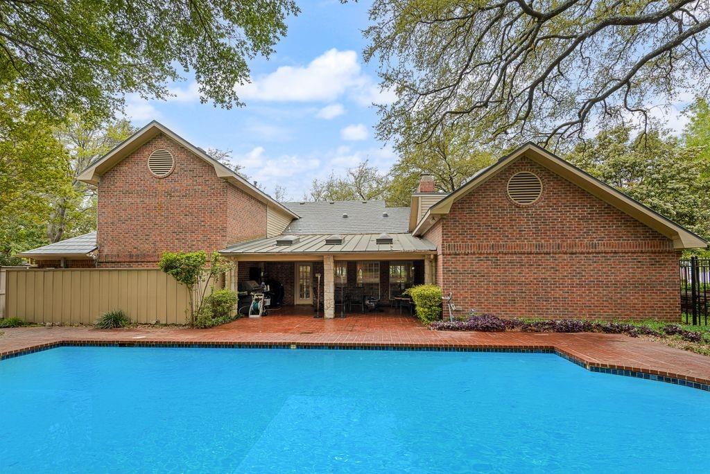 2 Eastshore Road Heath, TX 75032 - Photo 29 of 30 a front view of a house with garden