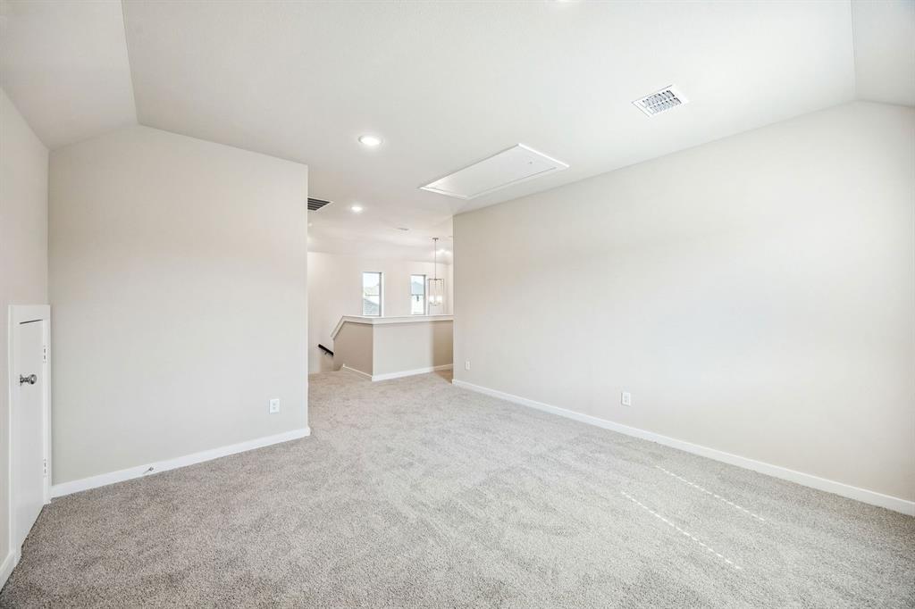 8360 Kingfisher Road Pilot Point, TX 76258 - Photo 28 of 37 a view of a room with a refrigerator and window