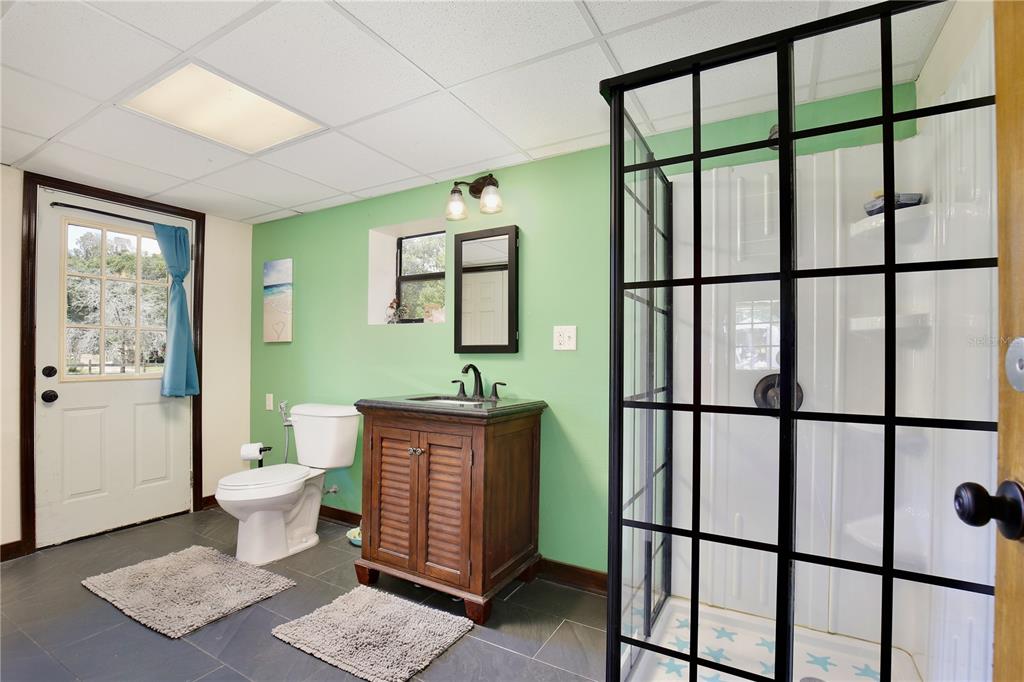 425 Mercers Fernery Road DeLand, FL 32720 - Photo 32 of 54 a bathroom with a toilet sink and a shower