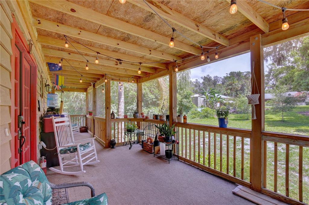 425 Mercers Fernery Road DeLand, FL 32720 - Photo 4 of 54 a view of a room with gym equipment