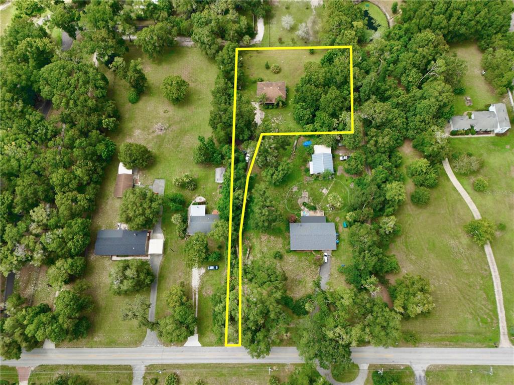 425 Mercers Fernery Road DeLand, FL 32720 - Photo 41 of 54 an aerial view of a house