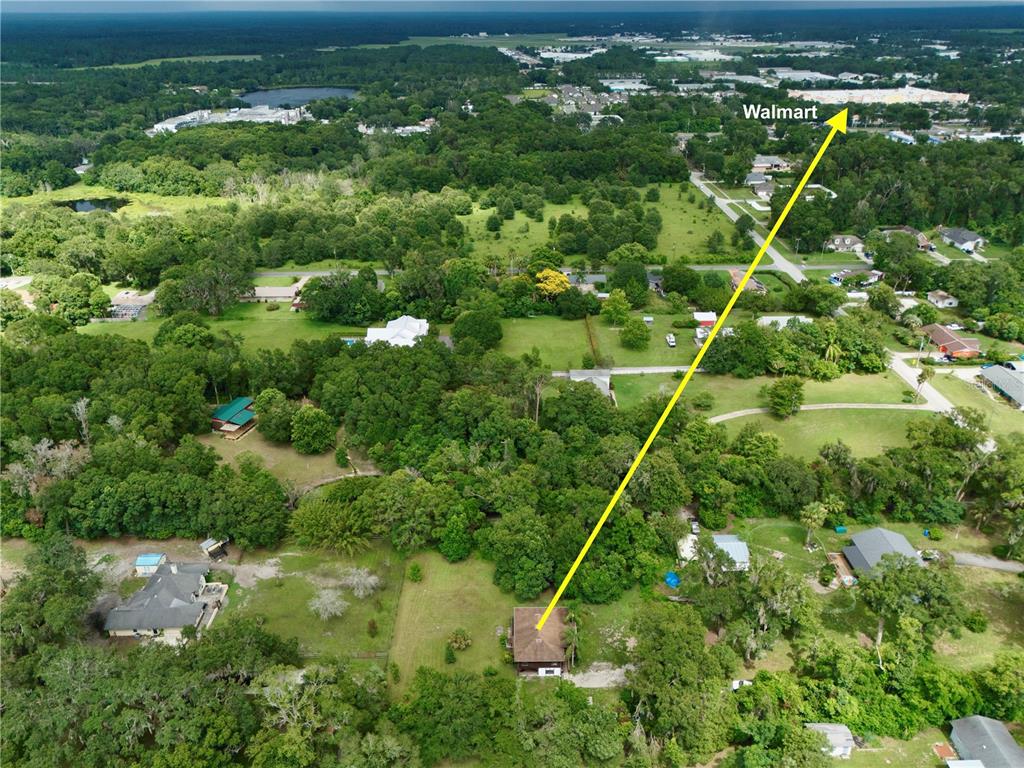 425 Mercers Fernery Road DeLand, FL 32720 - Photo 48 of 54 a view of a tennis court