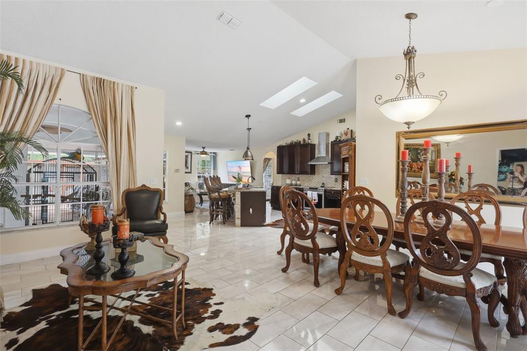 1898 Blackwelder Road De Leon Springs, FL 32130 - Photo 6 of 33 a room with lots of chairs and mirrors