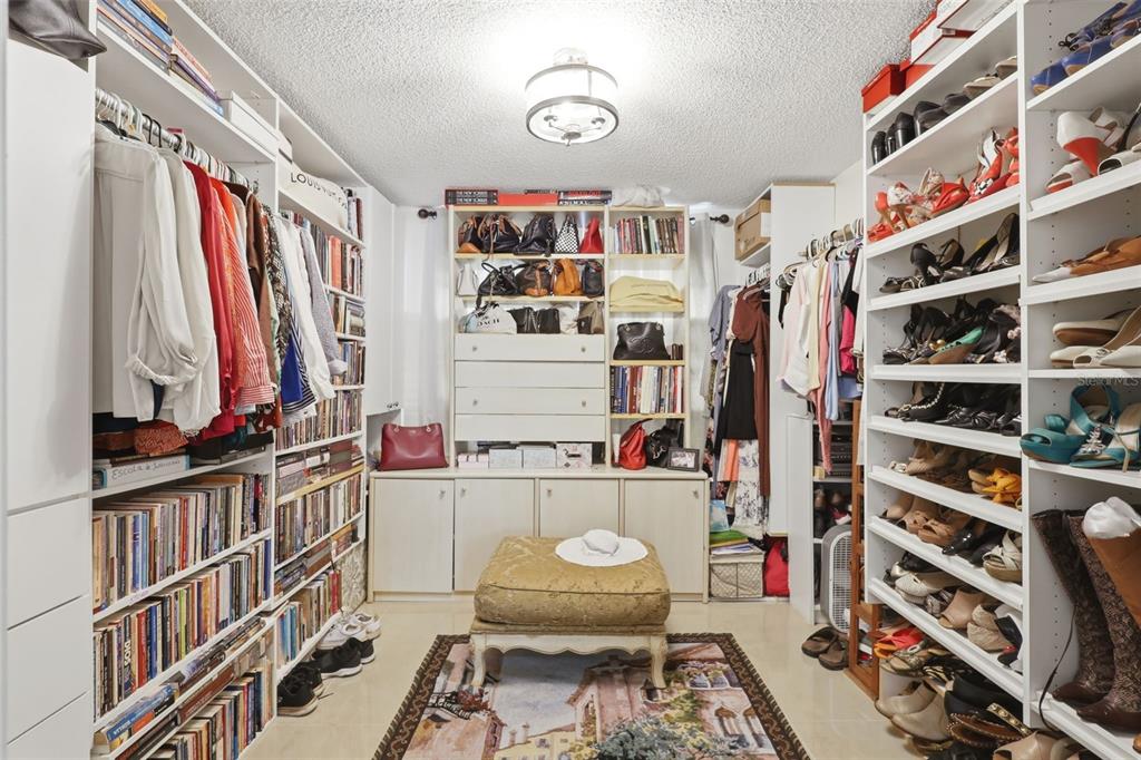 1898 Blackwelder Road De Leon Springs, FL 32130 - Photo 10 of 33 a view of walk in closet with clothes and shoes