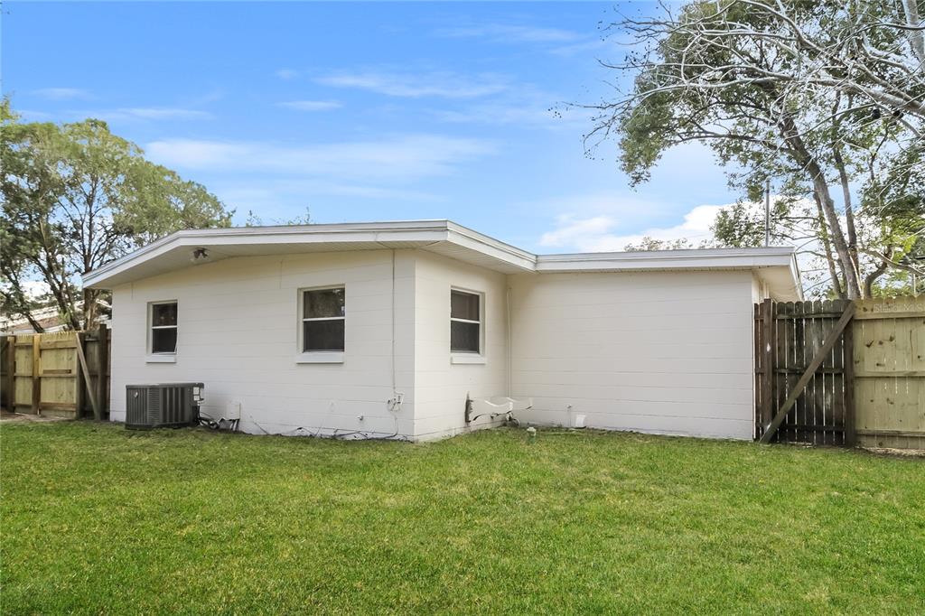 11623 Cameron Street Orlando, FL 32817 - Photo 14 of 16 a view of a house with backyard