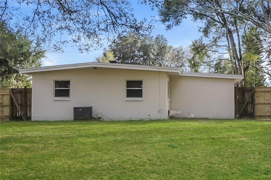 11623 Cameron Street Orlando, FL 32817 - Photo 15 of 16 a view of a house with a yard