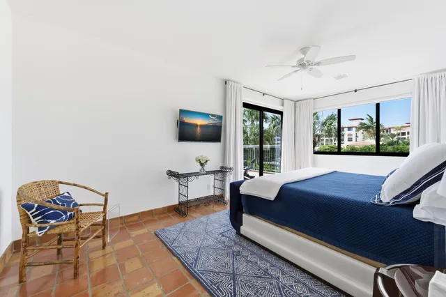 a view of swimming pool with seating area