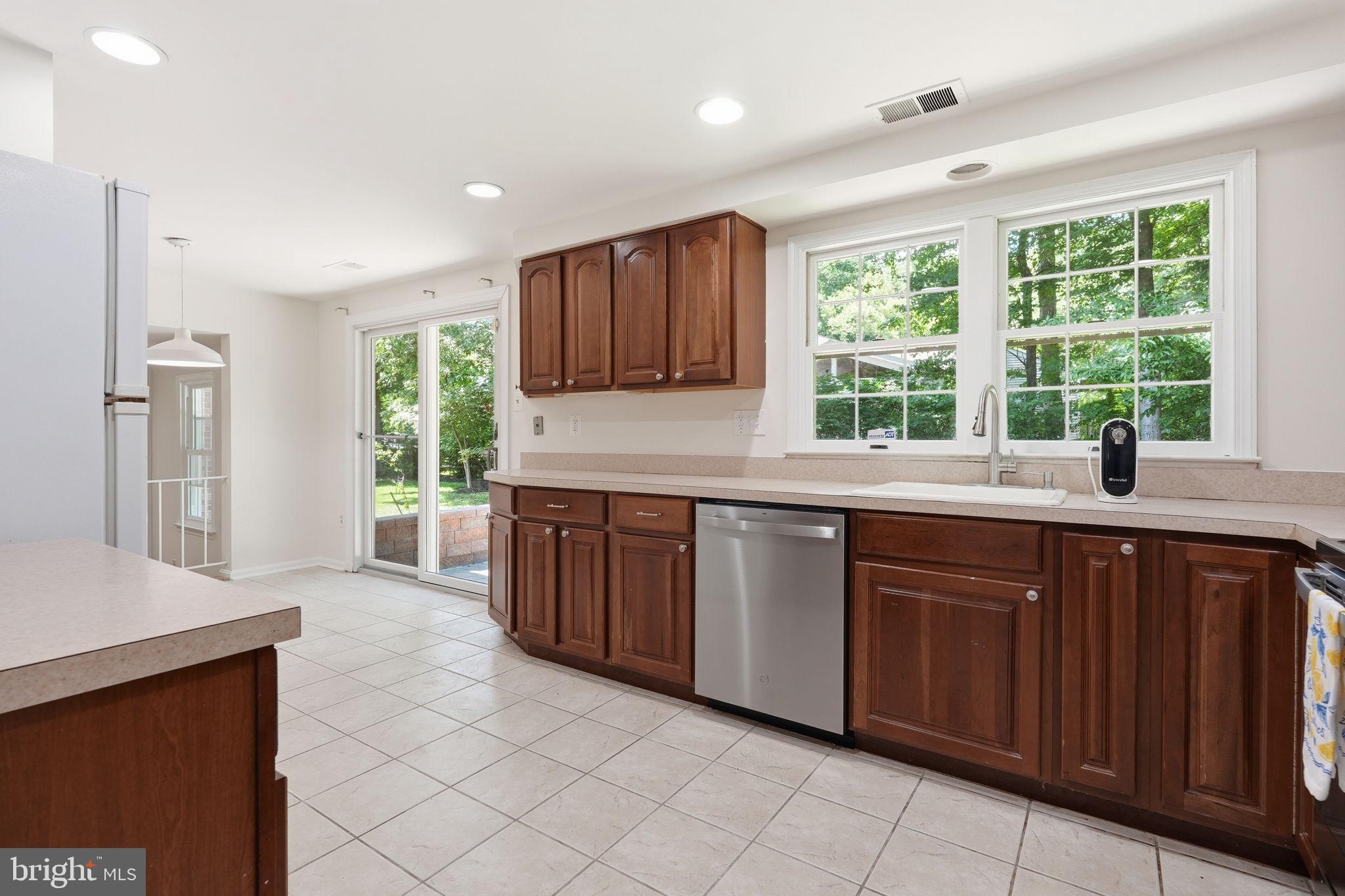 6017 Misty Arch Run Columbia, MD 21044 - Photo 10 of 39 Bright kitchen with natural light.