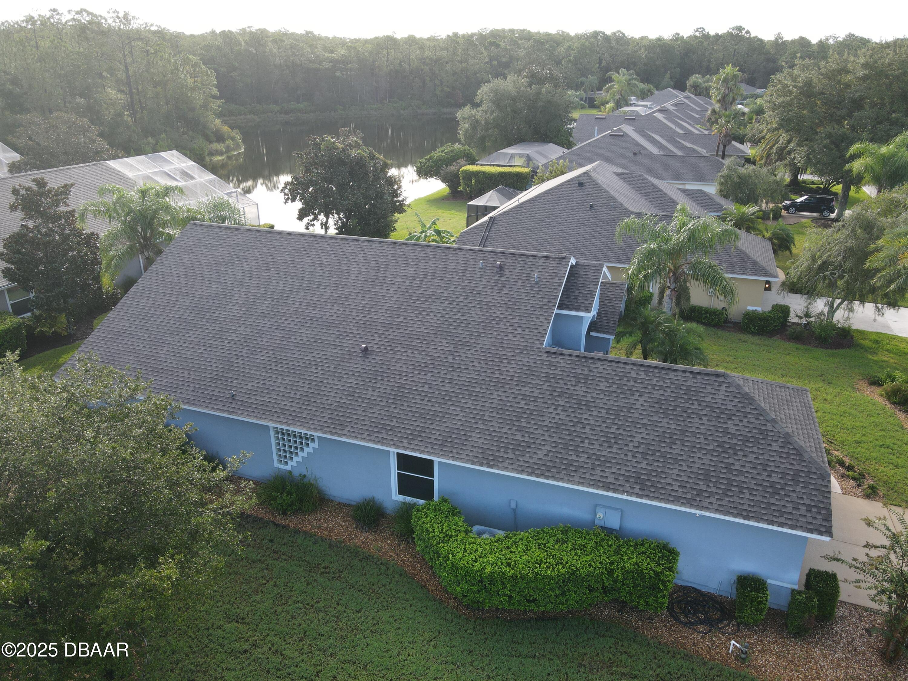 1279 Royal Pointe Lane Ormond Beach, FL 32174 - Photo 24 of 24 an aerial view of a house with a garden