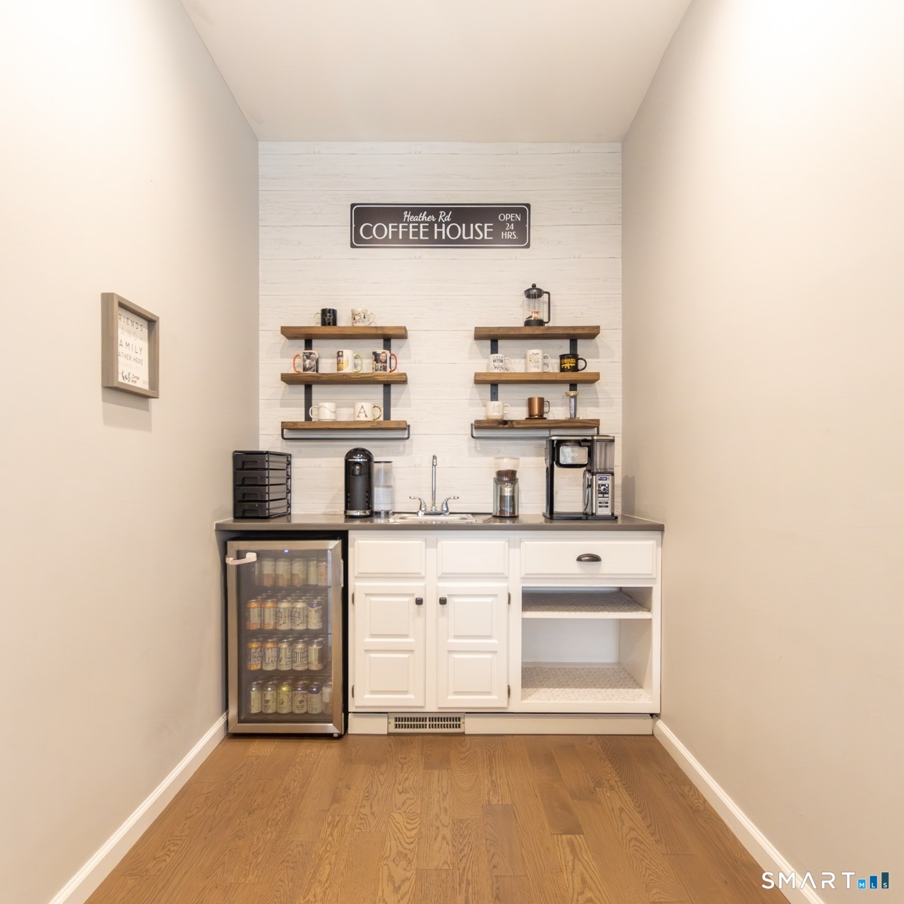 66 Heather Road Monroe, CT 06468 - Photo 16 of 40 a view of cabinets with wooden floor