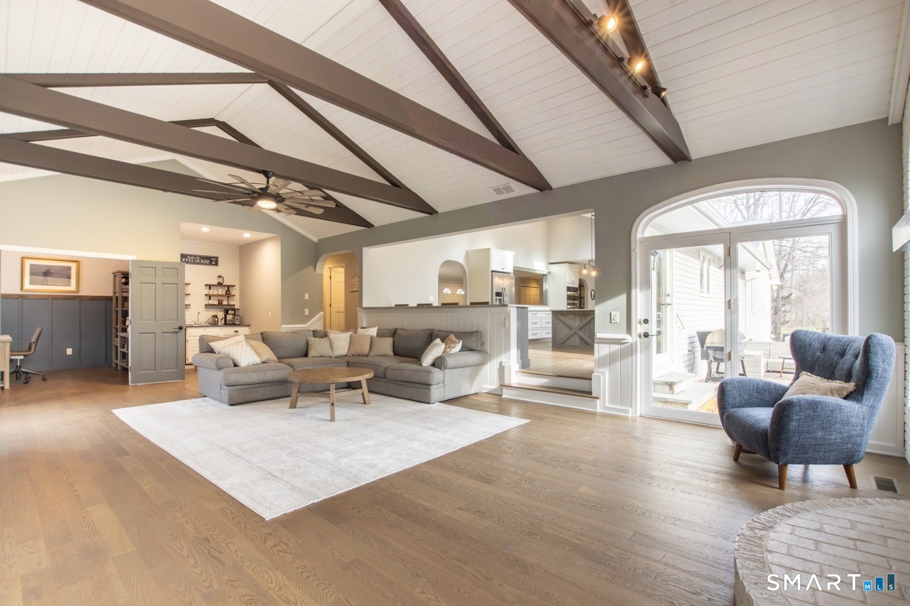 66 Heather Road Monroe, CT 06468 - Photo 17 of 40 a living room with furniture and a large window