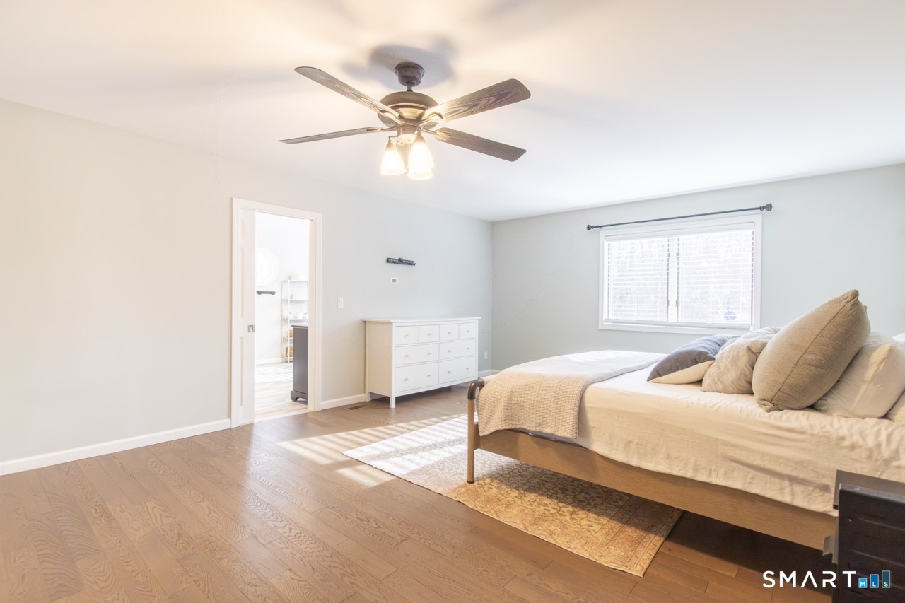 66 Heather Road Monroe, CT 06468 - Photo 20 of 40 a bedroom with a bed and window