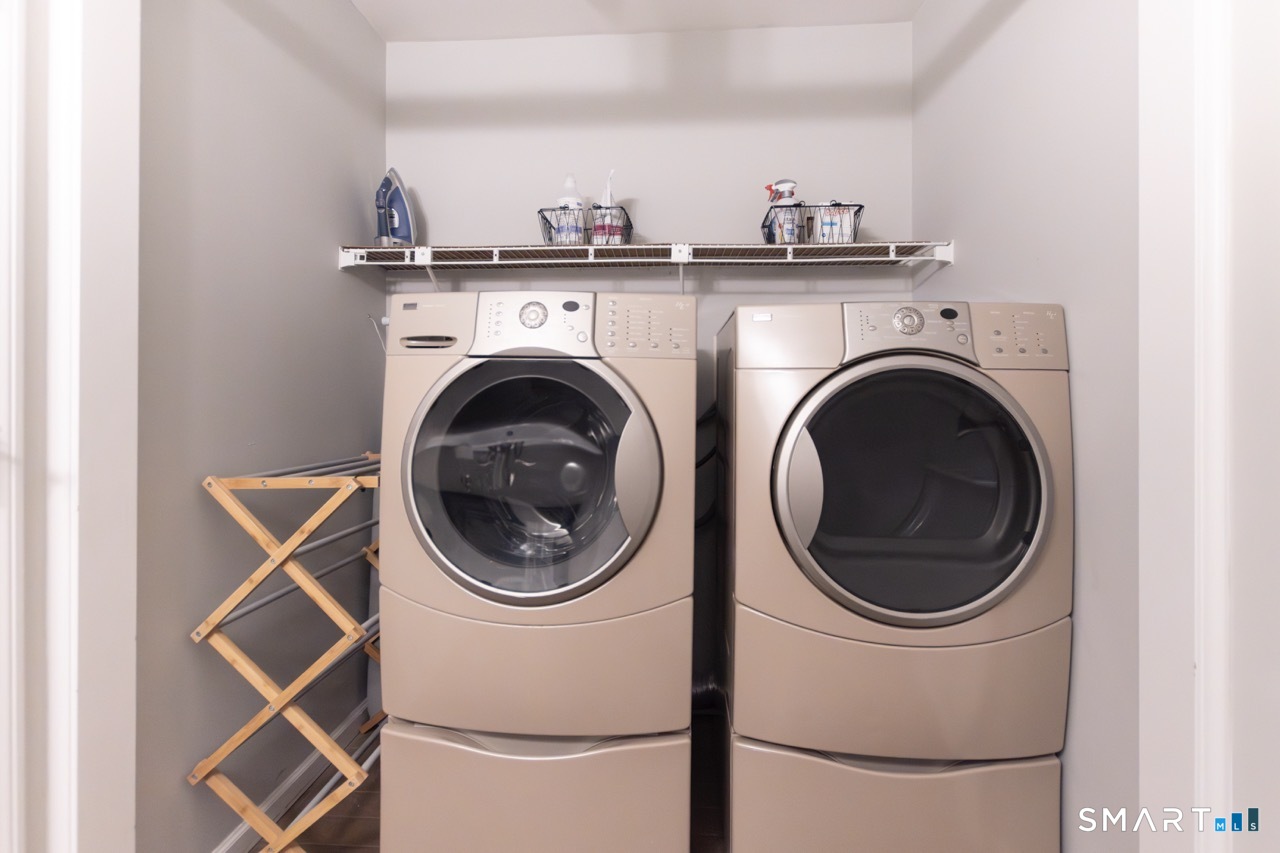 66 Heather Road Monroe, CT 06468 - Photo 29 of 40 a utility room with dryer and washer
