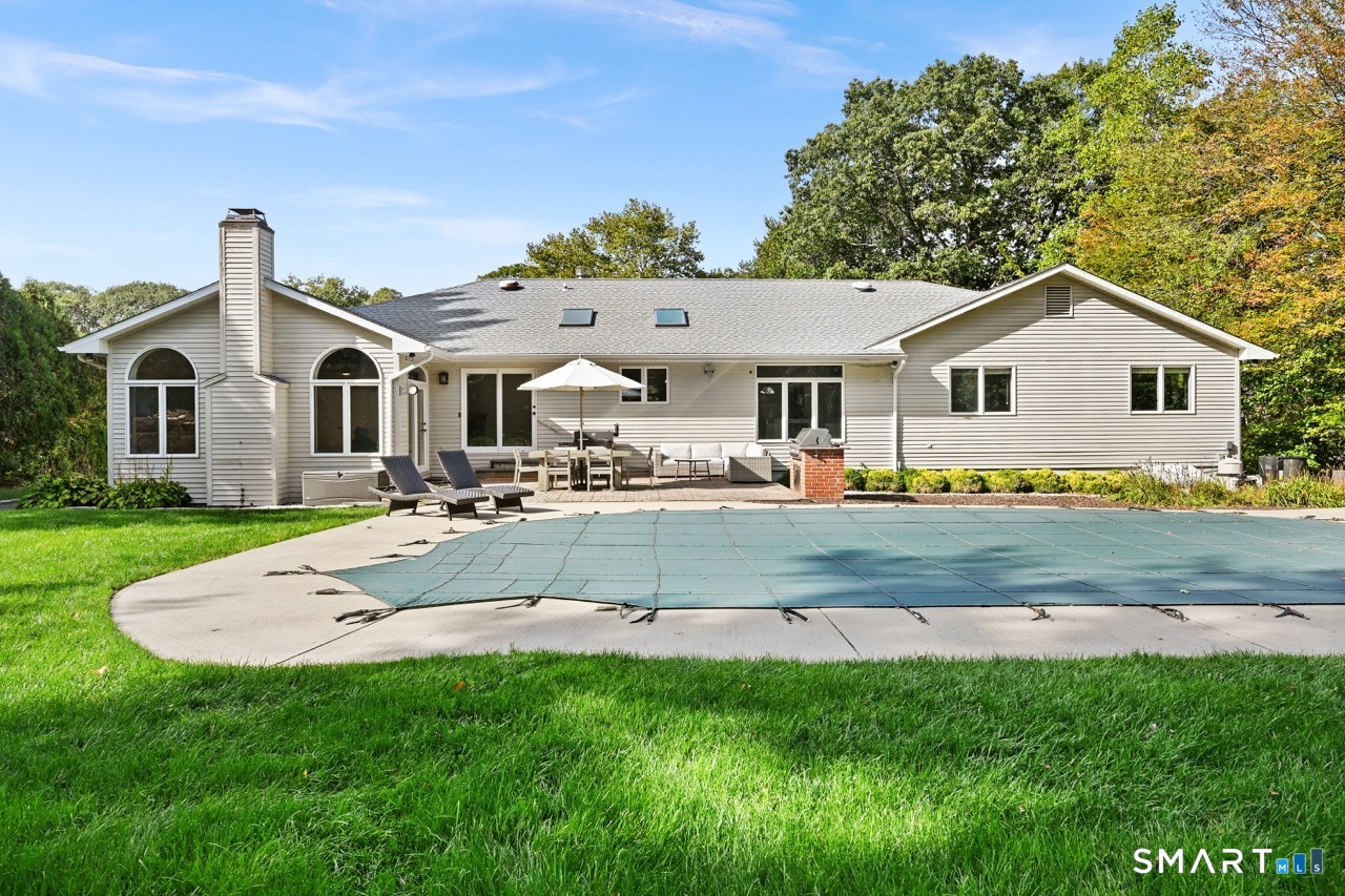66 Heather Road Monroe, CT 06468 - Photo 36 of 40 a front view of a house with a garden