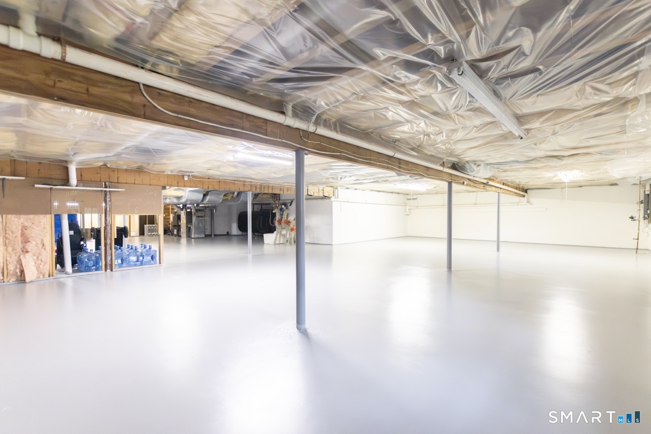 66 Heather Road Monroe, CT 06468 - Photo 37 of 40 a view of a water heater room with windows