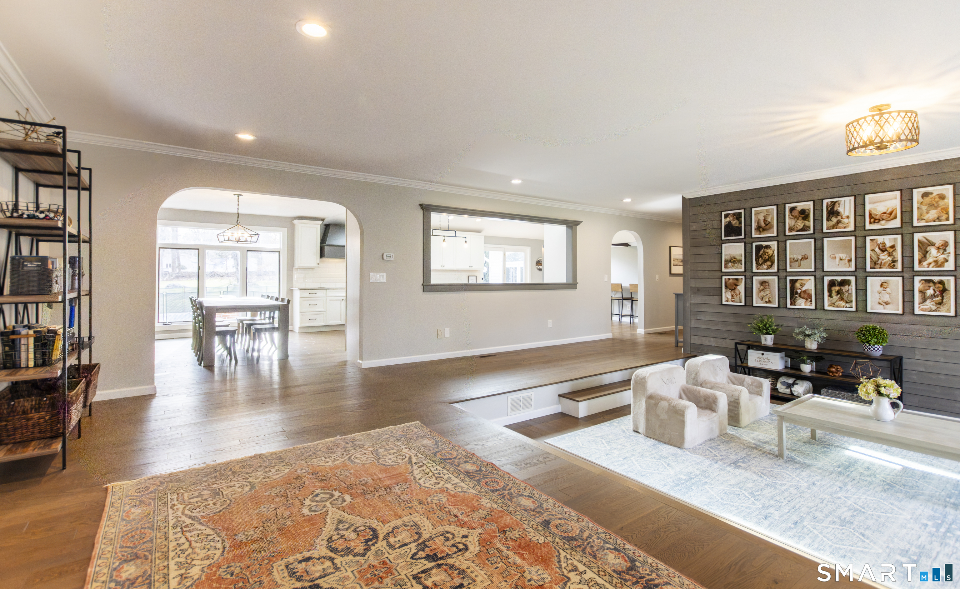 66 Heather Road Monroe, CT 06468 - Photo 5 of 40 a living room with furniture and a table with wooden floor