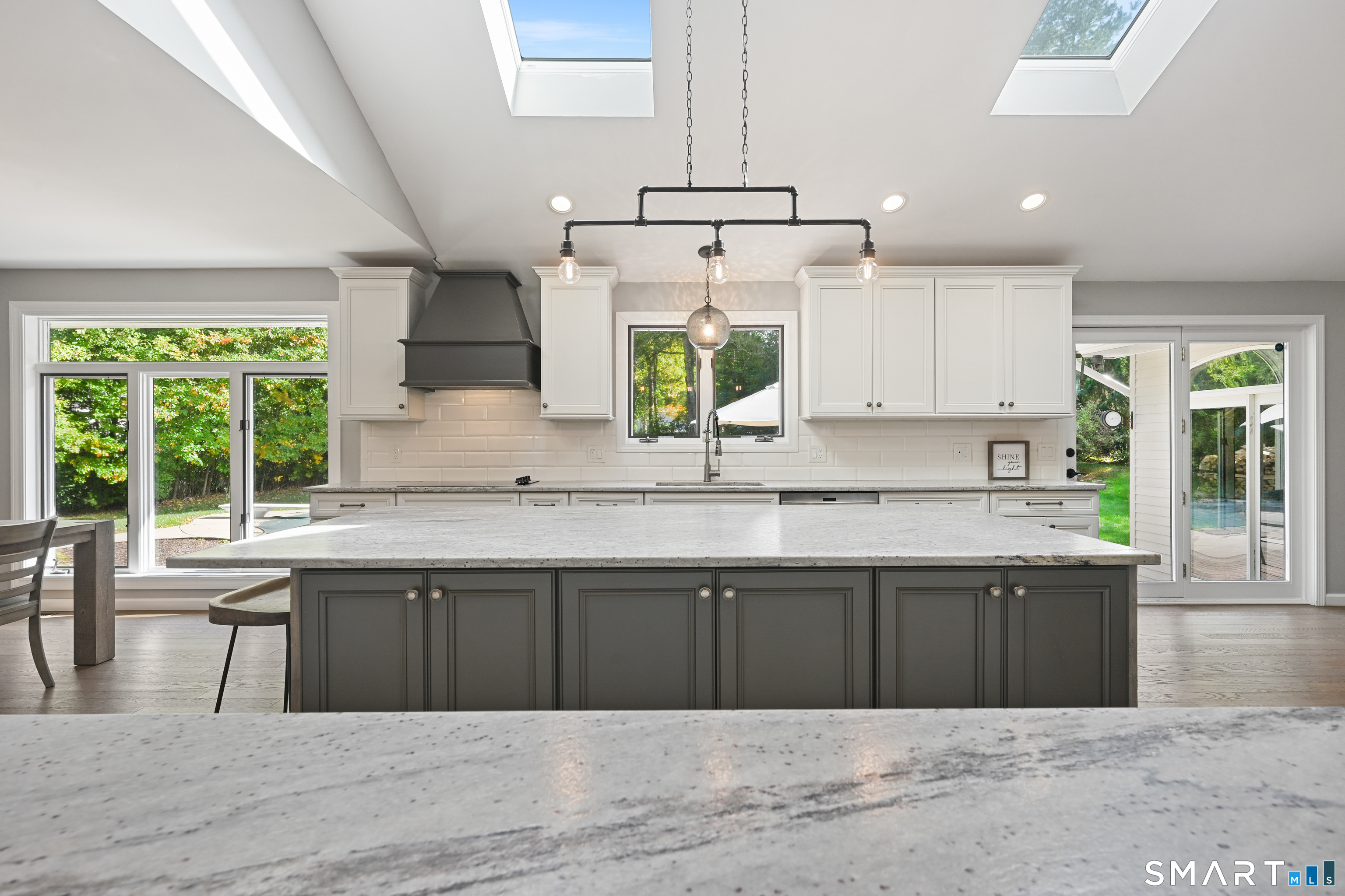 66 Heather Road Monroe, CT 06468 - Photo 8 of 40 a kitchen with a sink cabinets and window