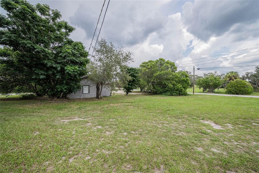 5 North Street Frostproof, FL 33843 - Photo 9 of 22 a fire hydrant in the middle of a field
