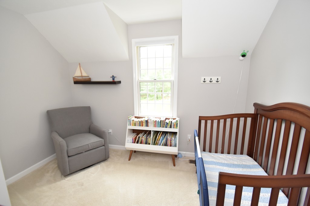16 Wayside Inn Road Framingham, MA 01701 - Photo 21 of 30 a bedroom with furniture and a window