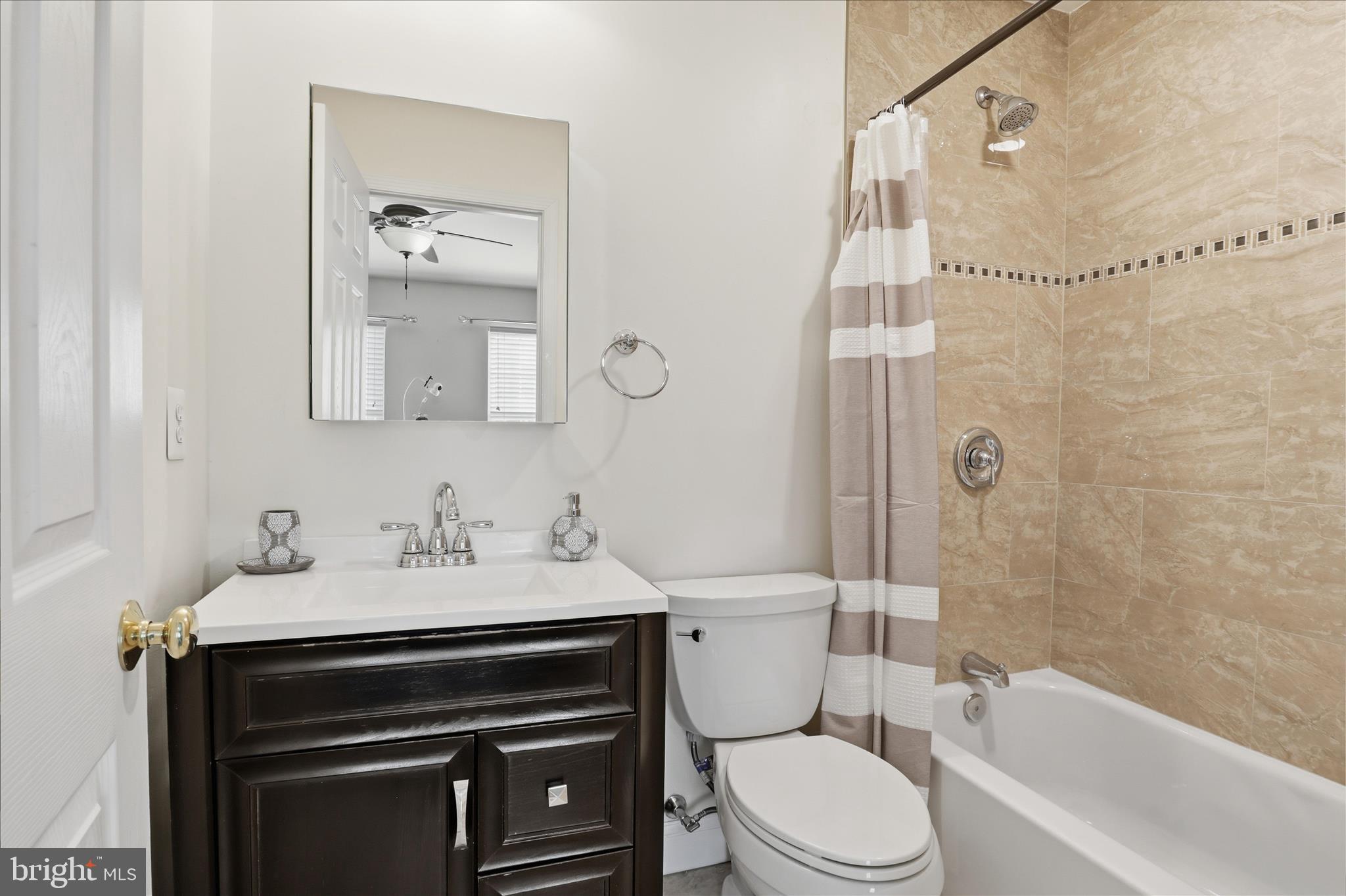 25114 Monteith Terrace Chantilly, VA 20152 - Photo 25 of 46 a bathroom with a sink toilet and shower