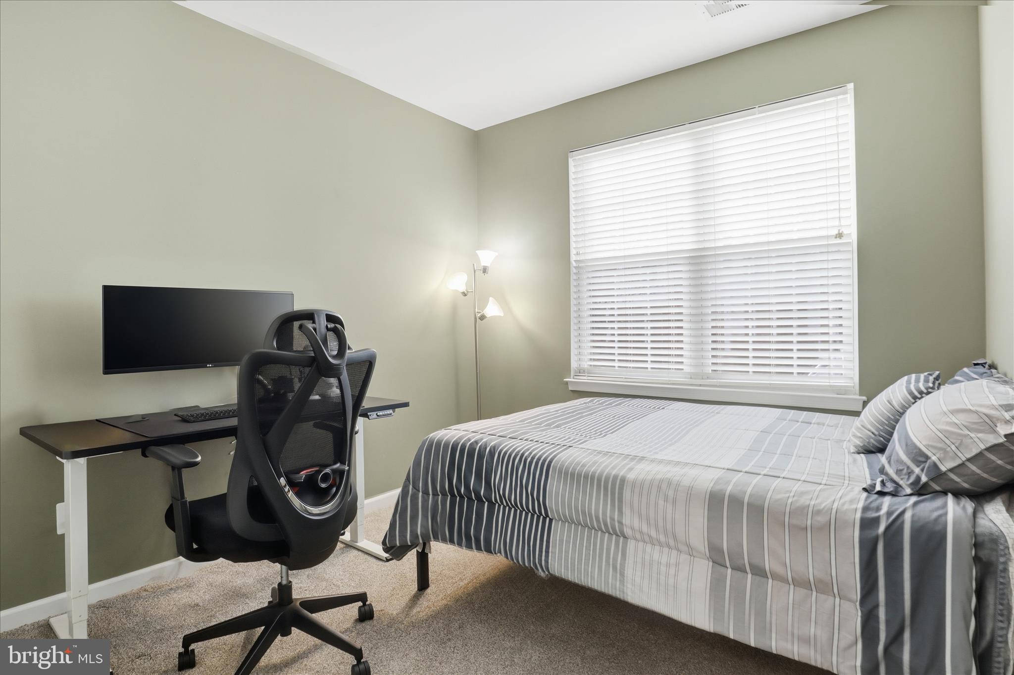 25114 Monteith Terrace Chantilly, VA 20152 - Photo 26 of 46 a bedroom with a bed and a window