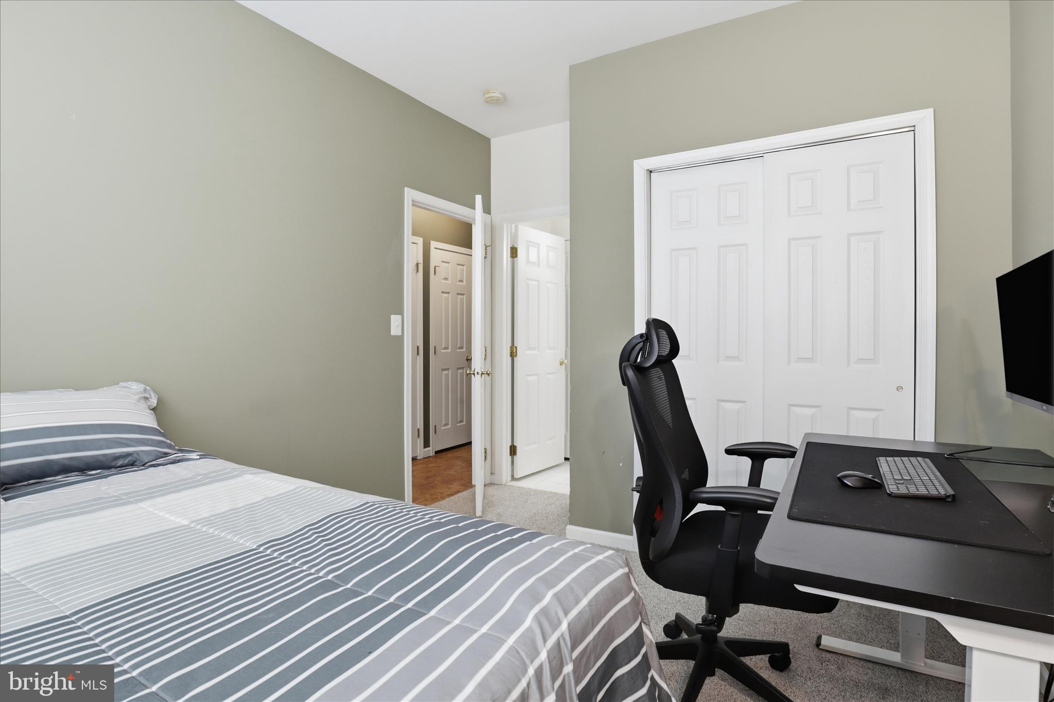 25114 Monteith Terrace Chantilly, VA 20152 - Photo 27 of 46 a bedroom with a chair and a window