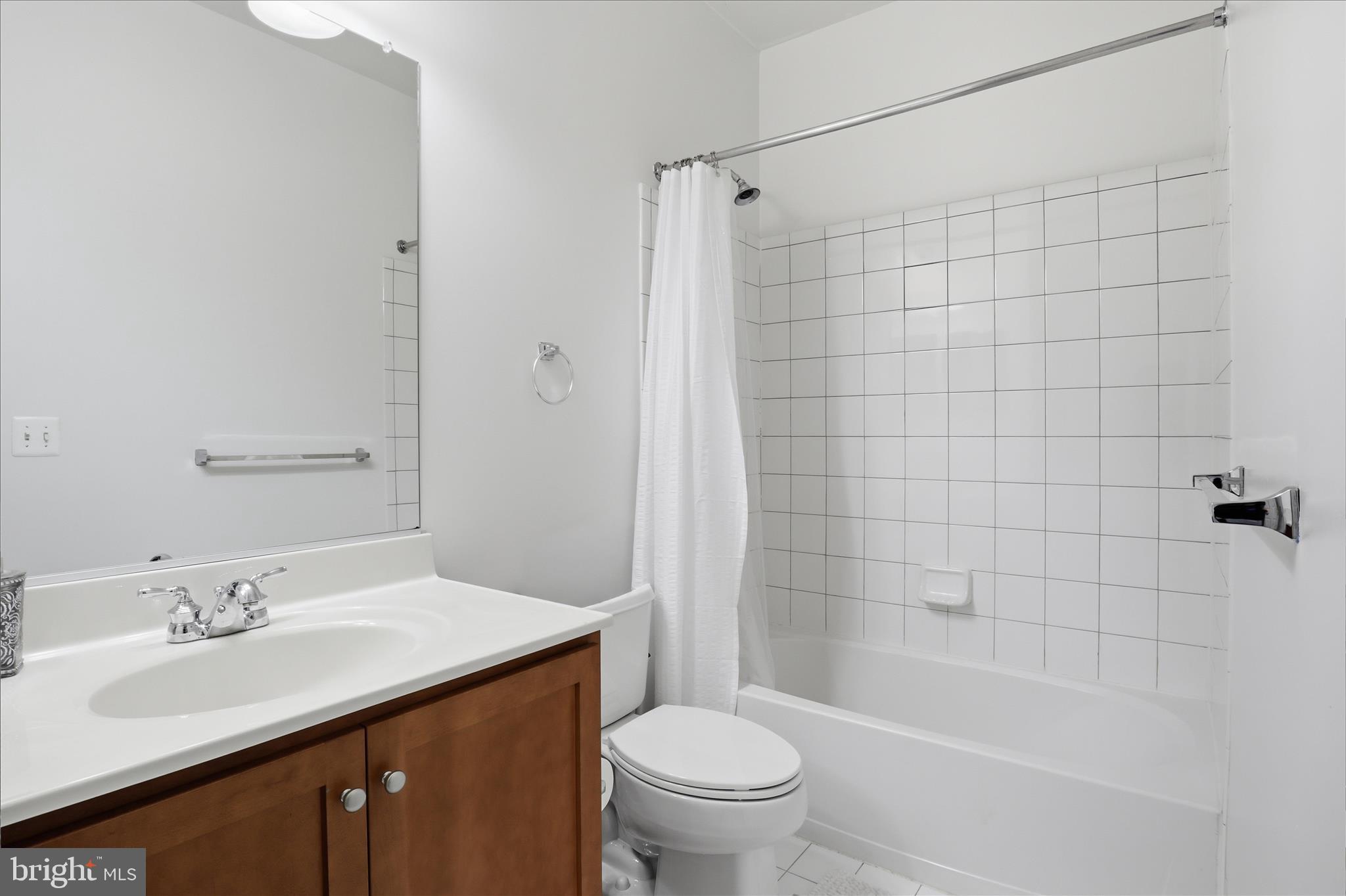 25114 Monteith Terrace Chantilly, VA 20152 - Photo 28 of 46 a bathroom with a sink a toilet and shower
