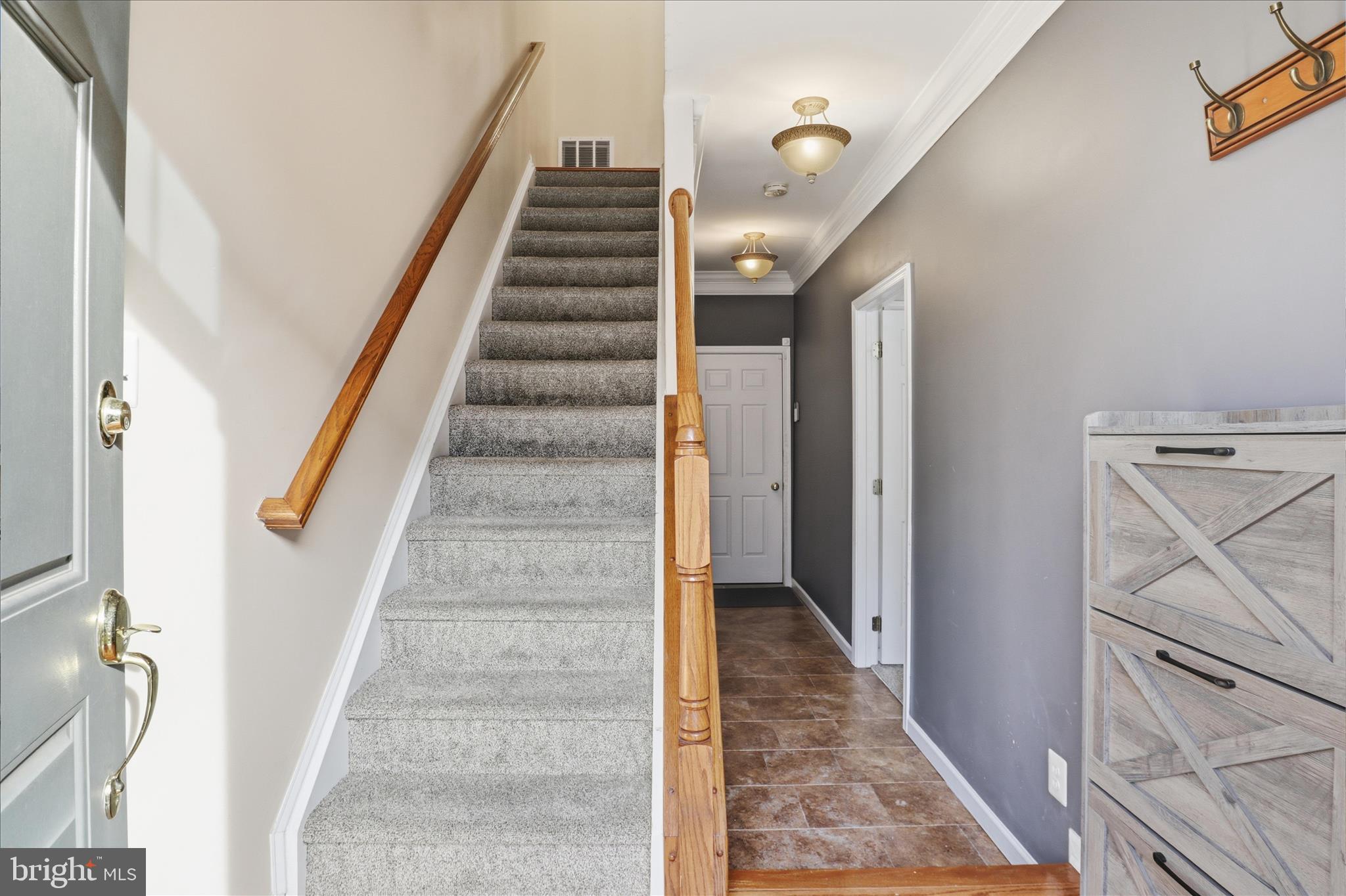 25114 Monteith Terrace Chantilly, VA 20152 - Photo 5 of 46 a view of an entryway with staircase