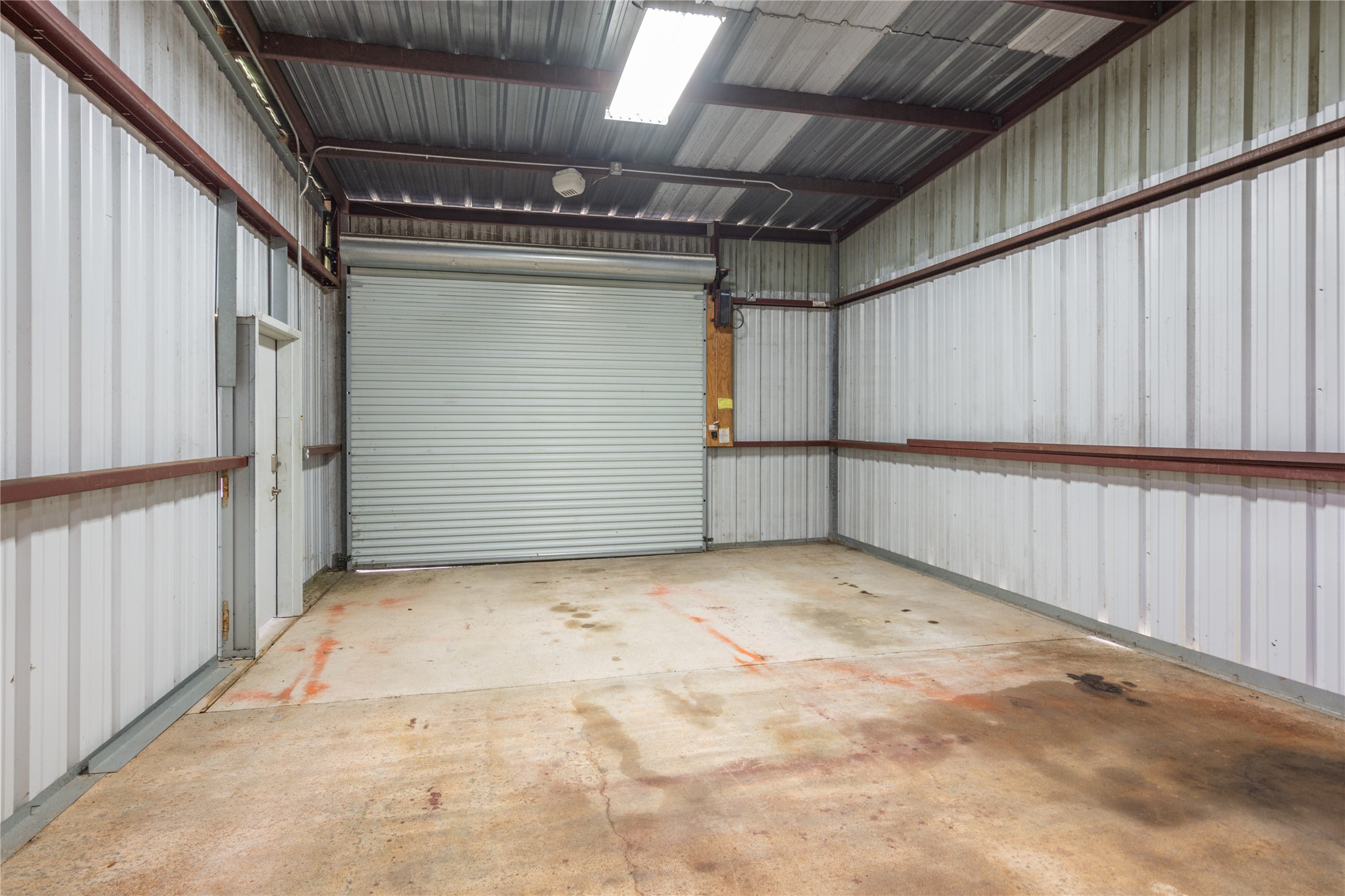 1112 Crenshaw Road Pasadena, TX 77504 - Photo 36 of 50 Enclosed single bay Garage w/ utility dr. & Auto roll up door.