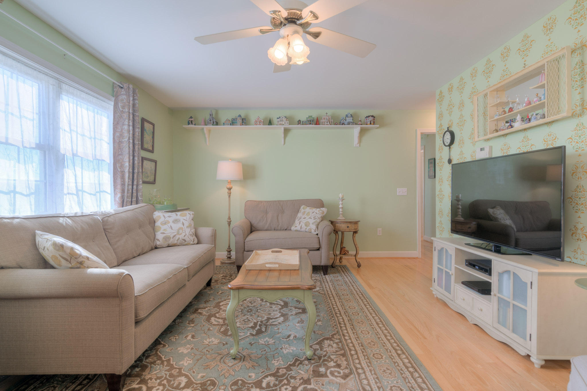 1675 Union Valley Road Riner, VA 24149 - Photo 11 of 50 a living room with furniture and a flat screen tv