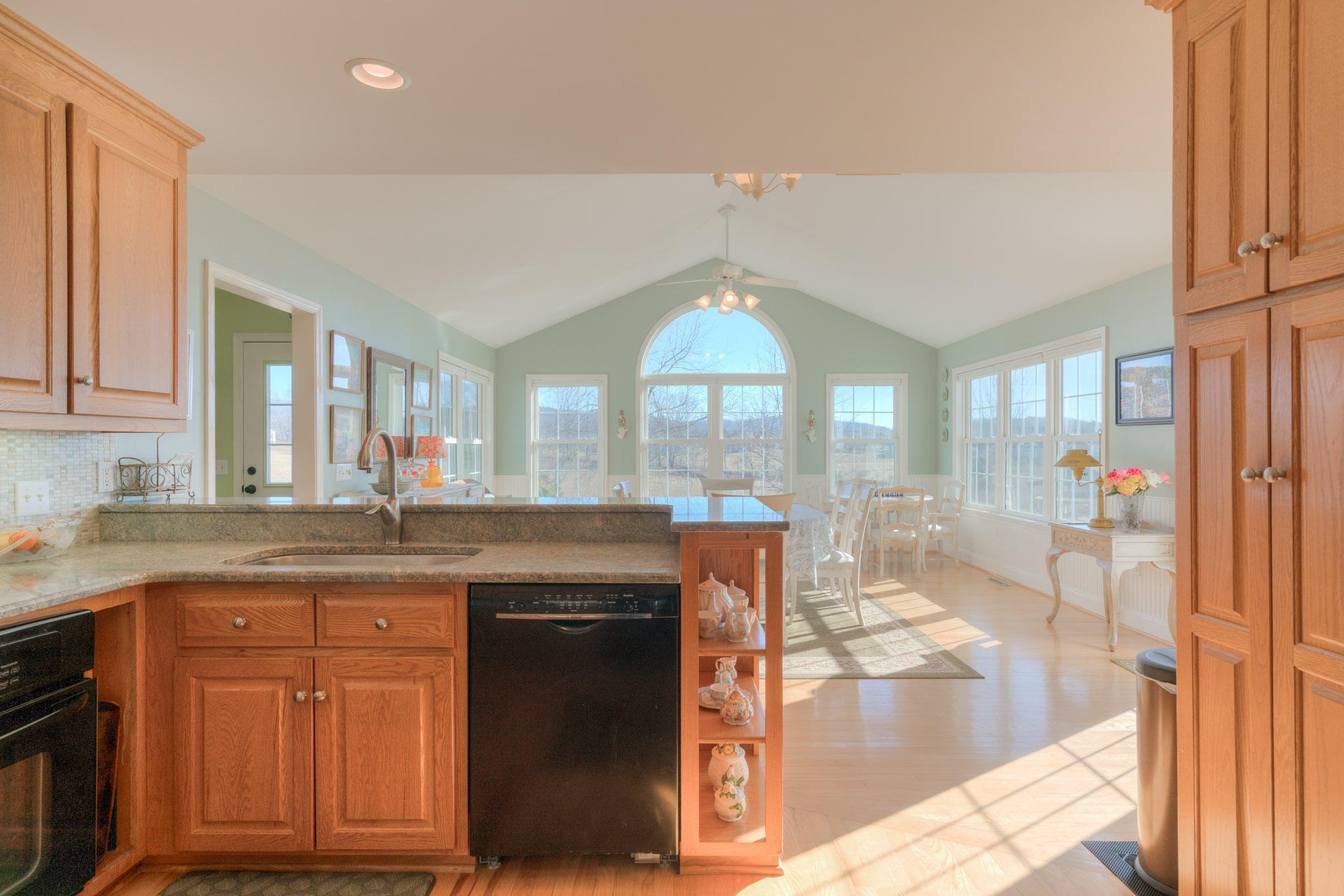 1675 Union Valley Road Riner, VA 24149 - Photo 16 of 50 a kitchen with granite countertop a sink and cabinets