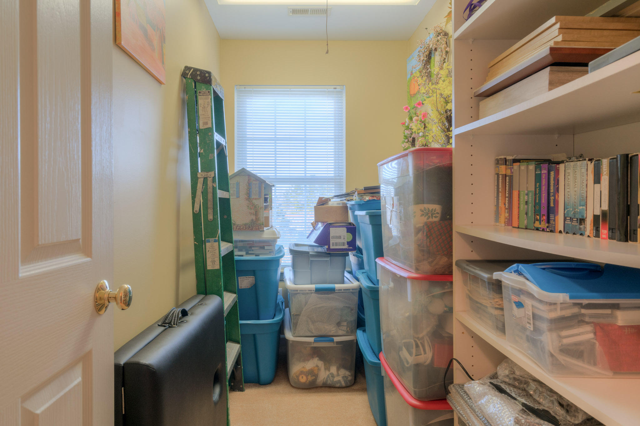 1675 Union Valley Road Riner, VA 24149 - Photo 33 of 50 a room with furniture and a book shelf