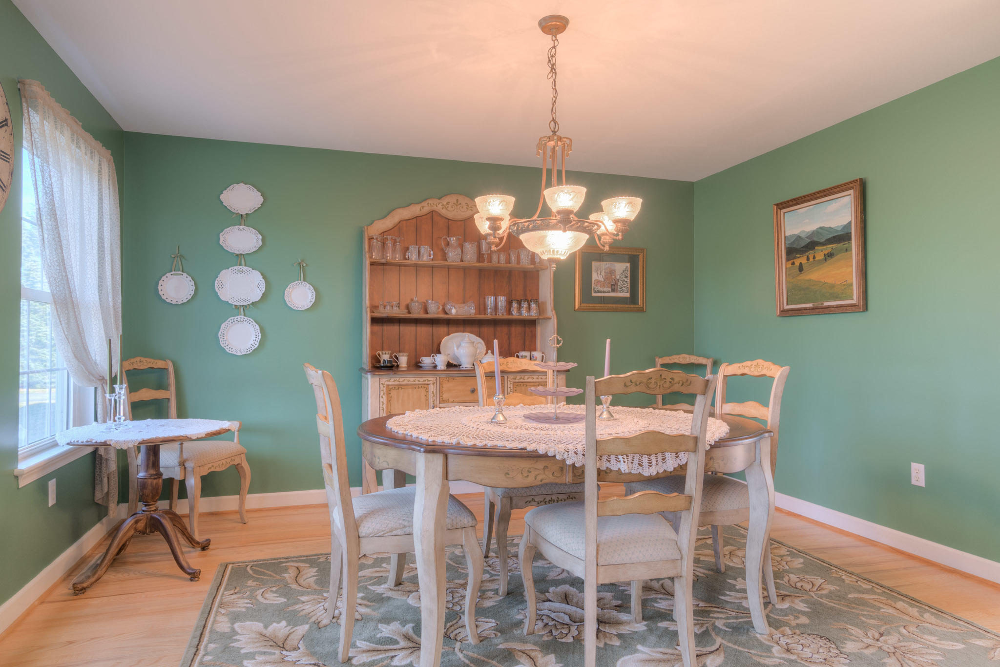 1675 Union Valley Road Riner, VA 24149 - Photo 5 of 50 a view of a dining room with furniture and chandelier