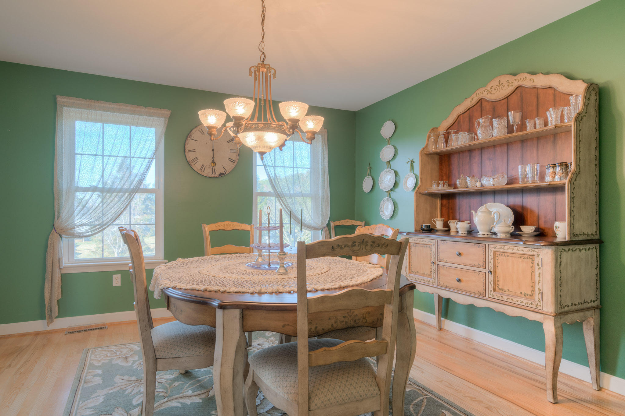 1675 Union Valley Road Riner, VA 24149 - Photo 6 of 50 a view of a dining room with furniture and chandelier