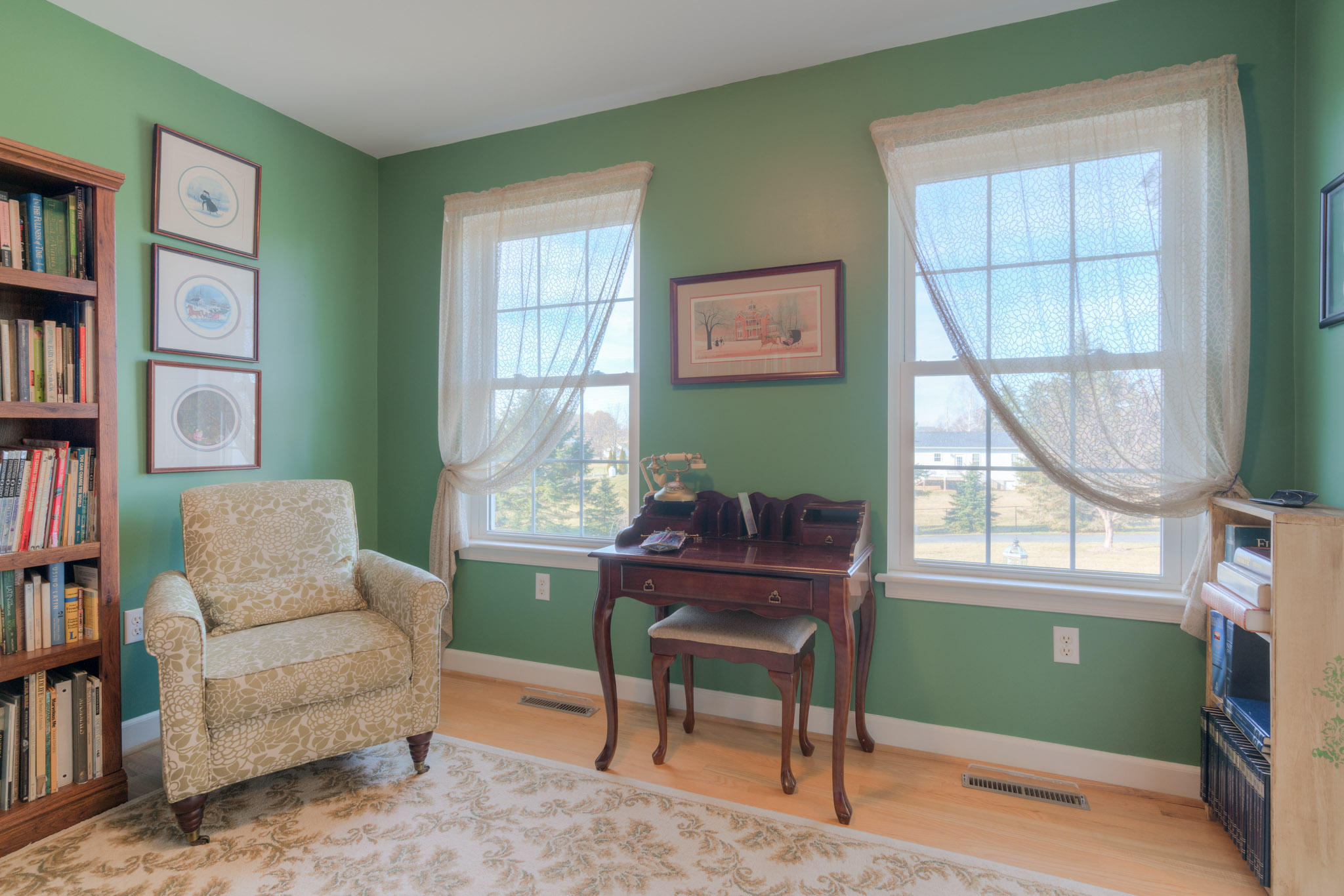 1675 Union Valley Road Riner, VA 24149 - Photo 9 of 50 a living room with furniture a window and a painting on the wall