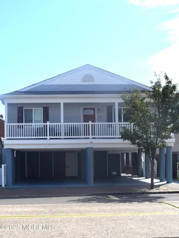 a view of staircase with white walls
