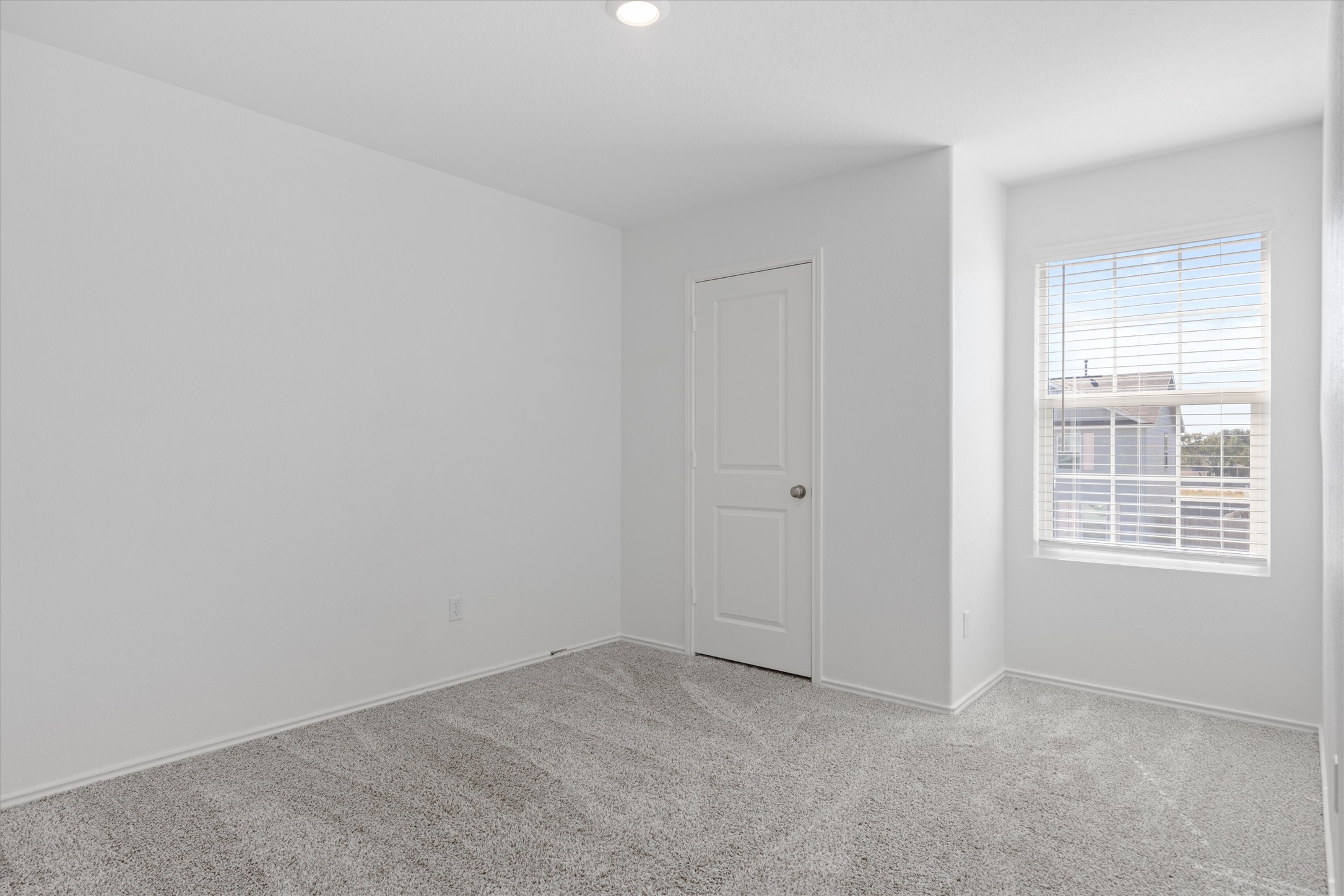 13520 Knights Branch Drive Elgin, TX 78621 - Photo 11 of 20 Unfurnished room with carpet and recessed lighting