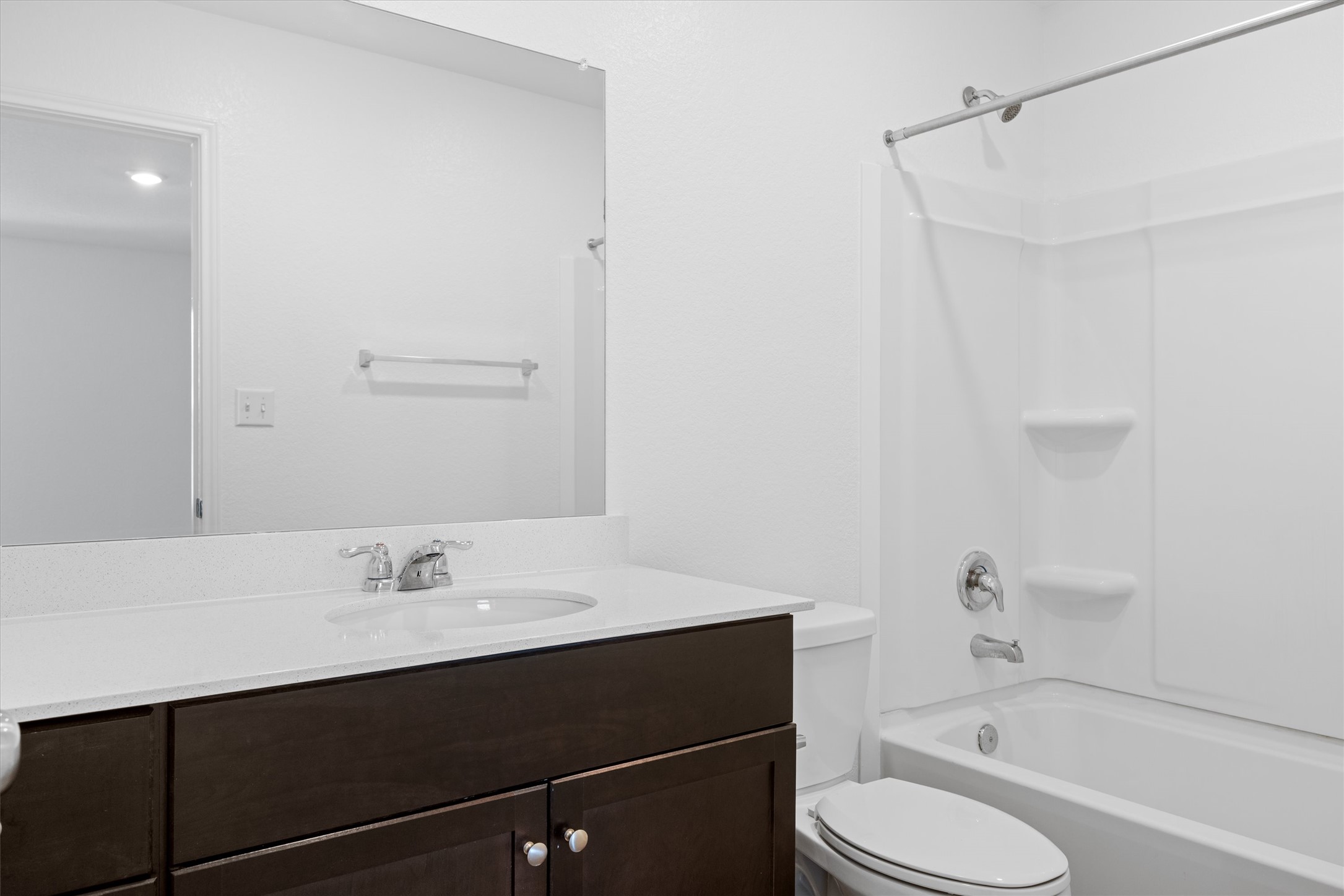 13520 Knights Branch Drive Elgin, TX 78621 - Photo 14 of 20 Full bathroom with vanity and shower / tub combination