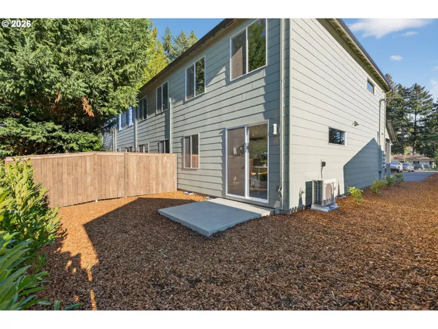 a house view with a backyard space