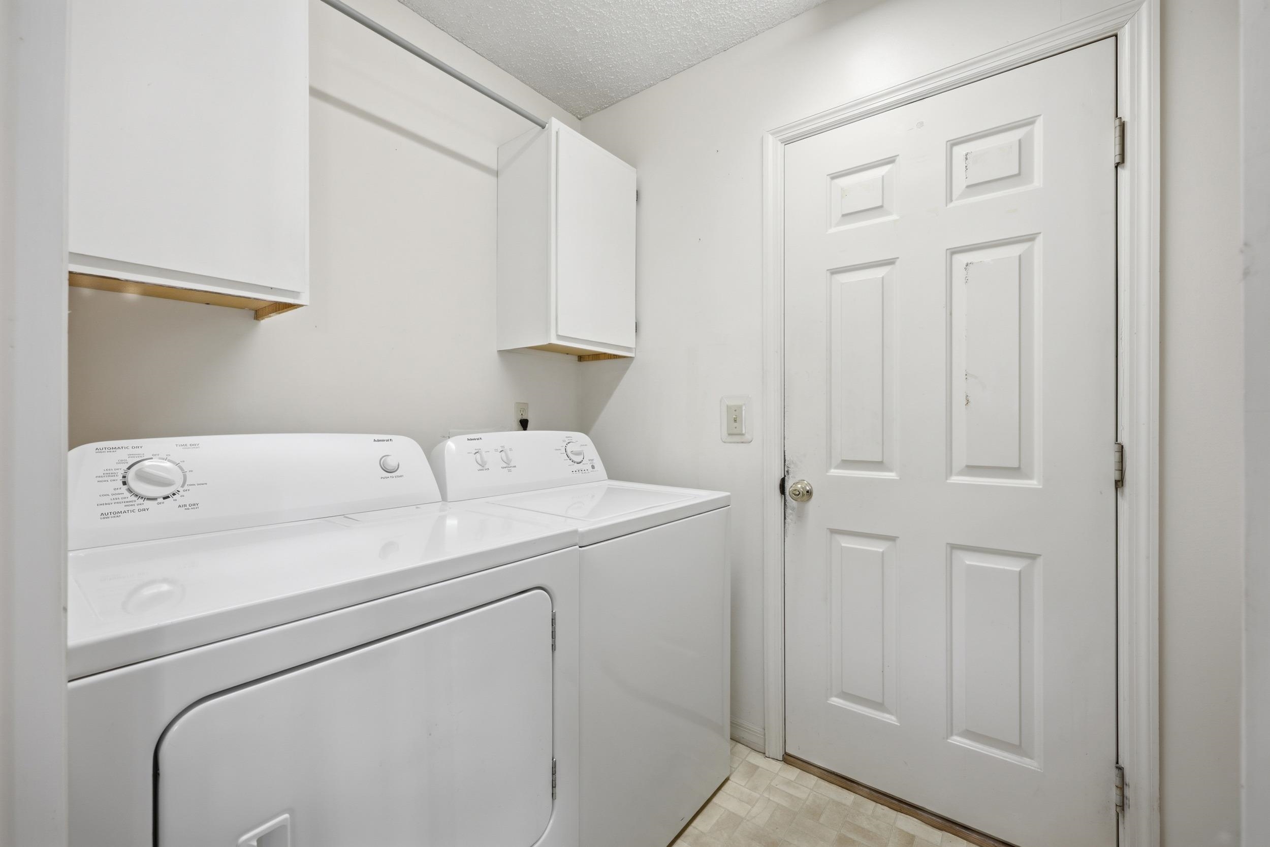 4628 Legends Lane Elkton, FL 32033 - Photo 15 of 49 a utility room with dryer and washer