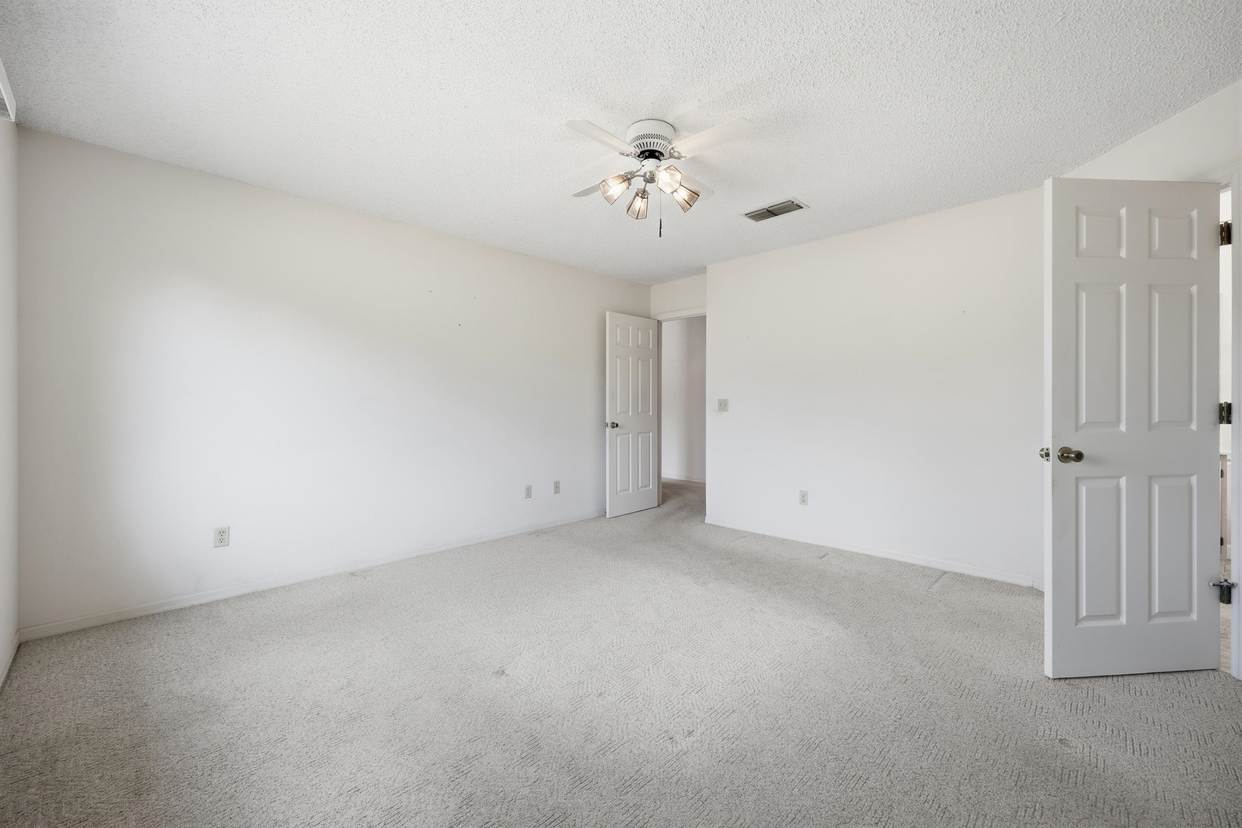 4628 Legends Lane Elkton, FL 32033 - Photo 19 of 49 an empty room with a window