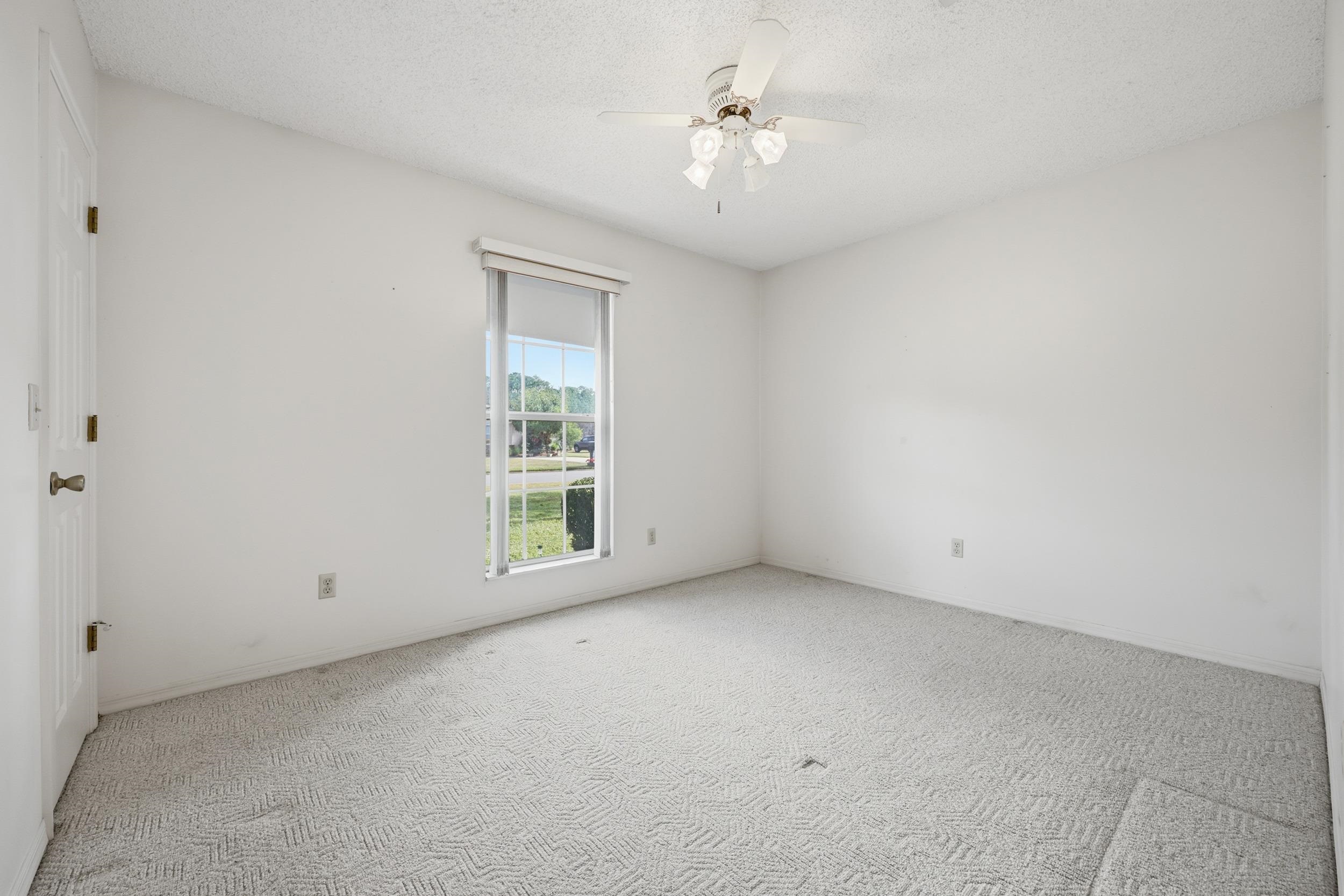 4628 Legends Lane Elkton, FL 32033 - Photo 24 of 49 an empty room with a window