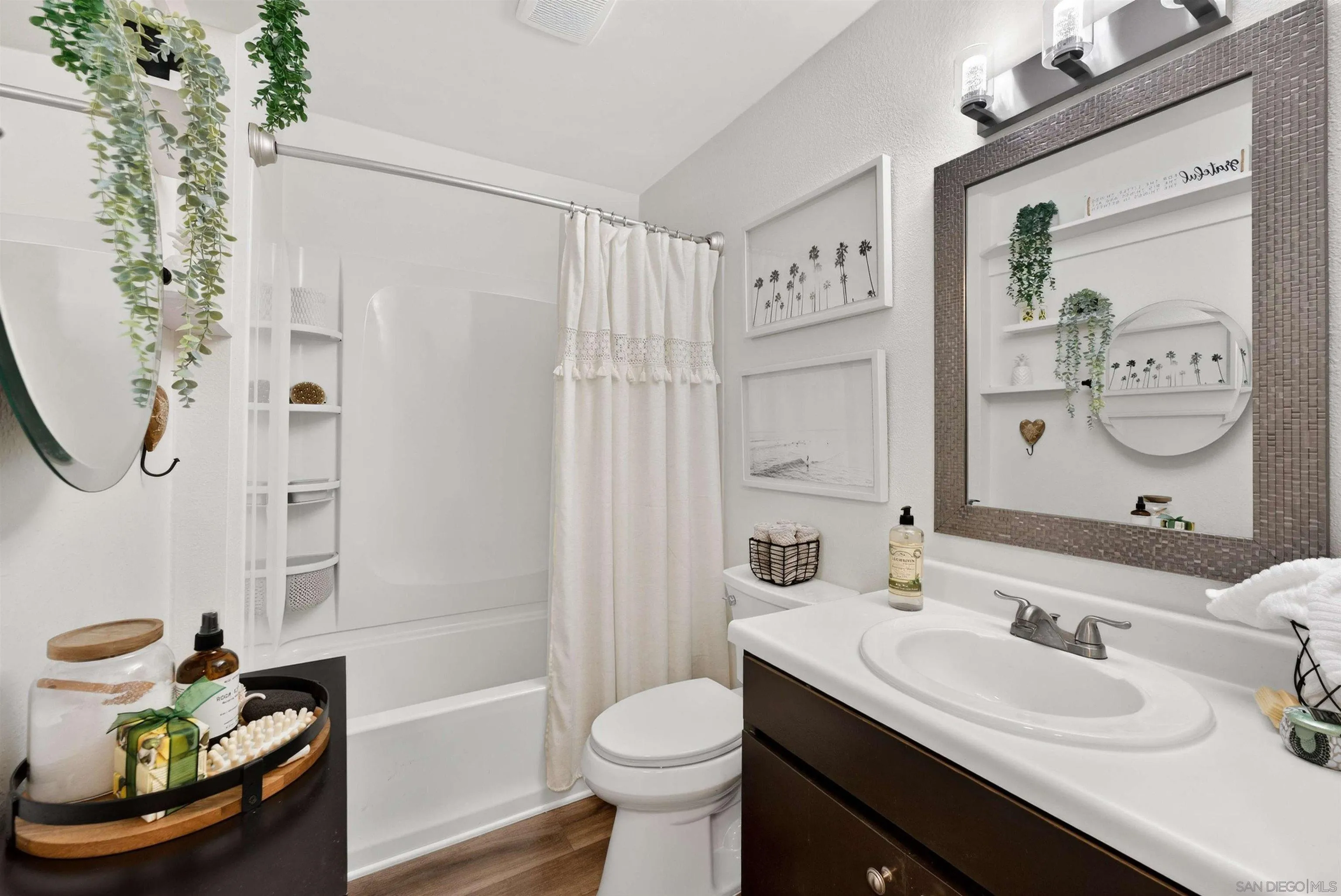 6255 Rancho Mission Road, Unit 302 San Diego, CA 92108 - Photo 25 of 28 a bathroom with a sink toilet and shower