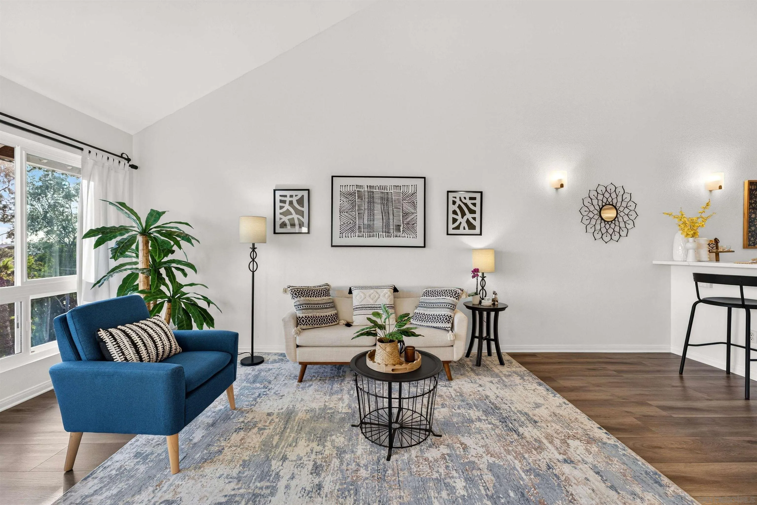 6255 Rancho Mission Road, Unit 302 San Diego, CA 92108 - Photo 5 of 28 a living room with furniture and wooden floor