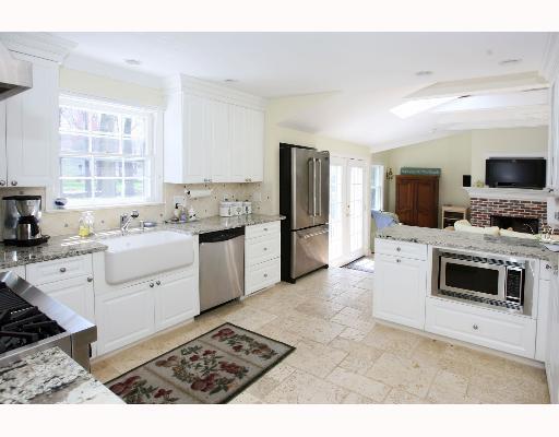 Undisclosed Address Darien, CT 06820 - Photo 4 of 7 a kitchen with a sink stove and refrigerator