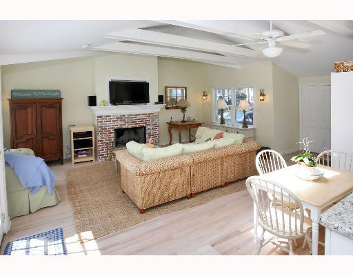 Undisclosed Address Darien, CT 06820 - Photo 5 of 7 a living room with fireplace furniture and a flat screen tv