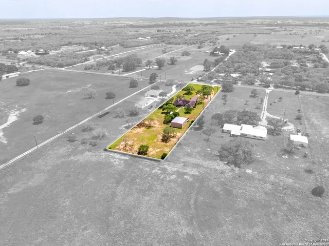 an aerial view of a swimming pool