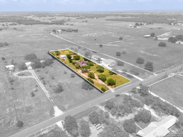 an aerial view of beach and ocean