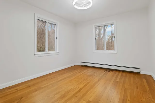 a view of livingroom with washer and dryer